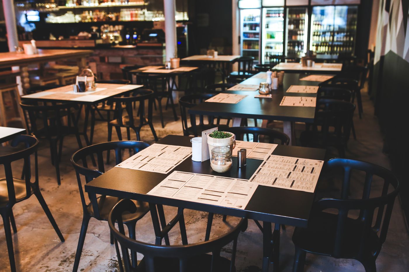 Traditional kopitiam interior with vintage tables and warm light
