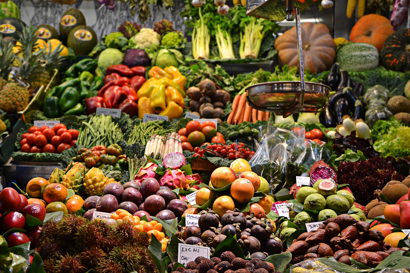 Busy market stalls with fresh produce